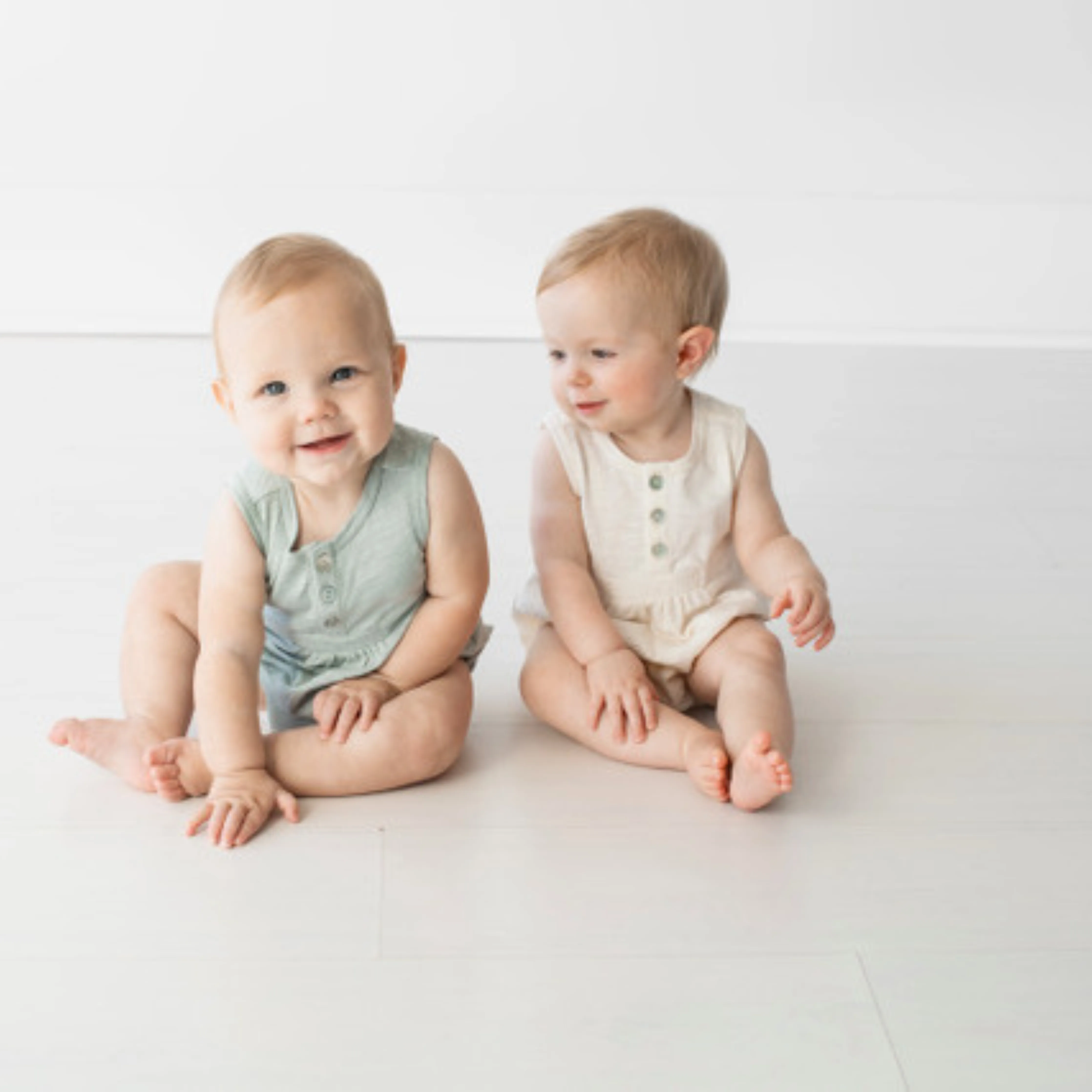 Paige Organic Cotton Sleeveless Henley Romper | Eco-Friendly Baby Romper in Seafoam or Ecru